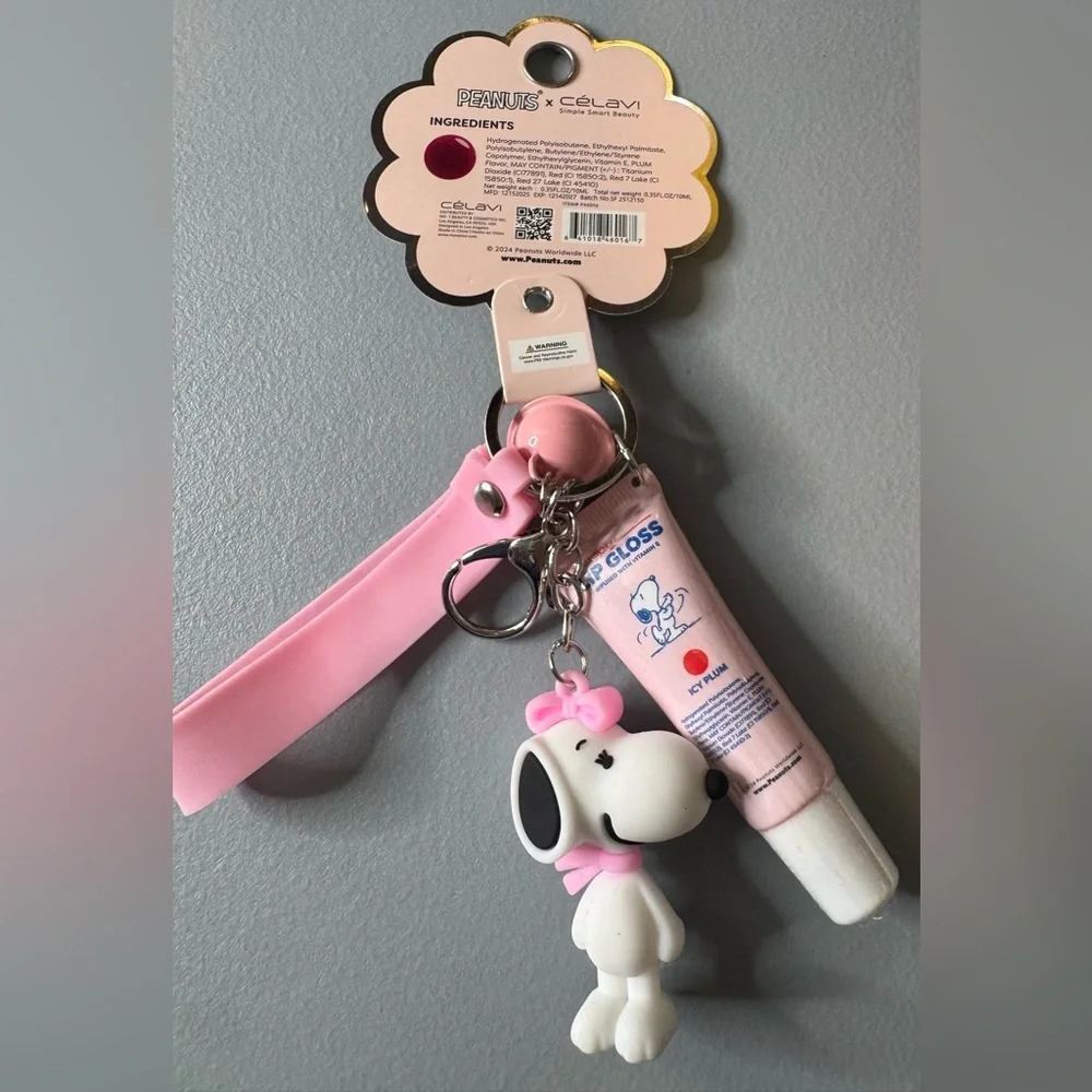 Peanuts x celavi Pink Snoopy Lip Gloss Keychain infused with Vitamin E plum
